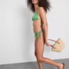 Bikinibroekje met bananenprint en strikjes aan de zijkant