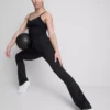 Hooggetailleerde, soepel ondersteunende, uitlopende sportlegging