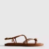 Paula Echevarría sandalen met bandjes en bedeltjes