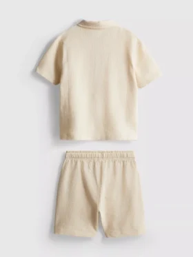 1-9 jaar | set bestaande uit een poloshirt met textuur en een korte broek