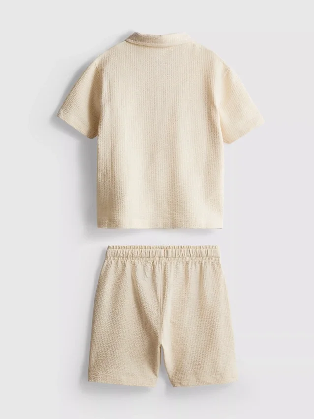 1-9 jaar | set bestaande uit een poloshirt met textuur en een korte broek
