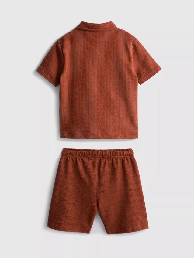 1-9 jaar | set bestaande uit een poloshirt met textuur en een korte broek