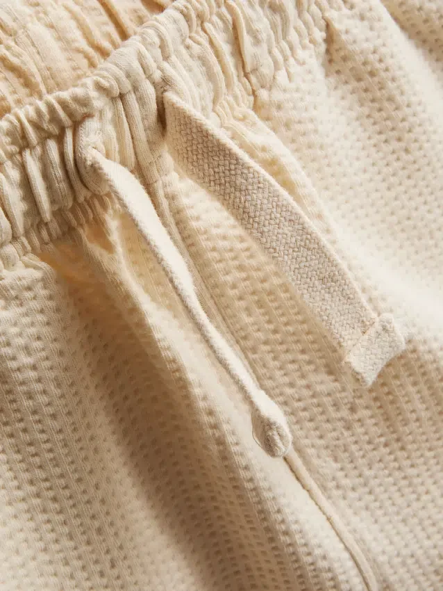 1-9 jaar | set bestaande uit een poloshirt met textuur en een korte broek