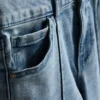 7-15 jaar | Jeans met plooien en uitlopende pijpen