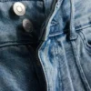 7-15 jaar | Jeans met plooien en uitlopende pijpen