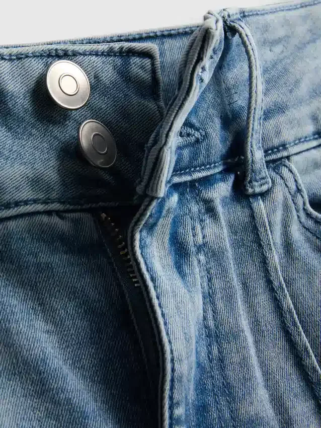7-15 jaar | Jeans met plooien en uitlopende pijpen