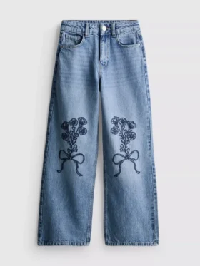 7-15 jaar | Jeans met wijde pijpen en geborduurde bloemenstrik