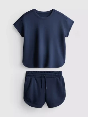 7-15 jaar | Set bestaande uit een boxy T-shirt en een hardloopshort