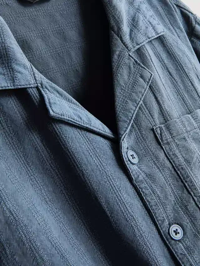 7-15 jaar | set bestaande uit een gestructureerd overhemd met korte mouwen en knopen en een korte broek