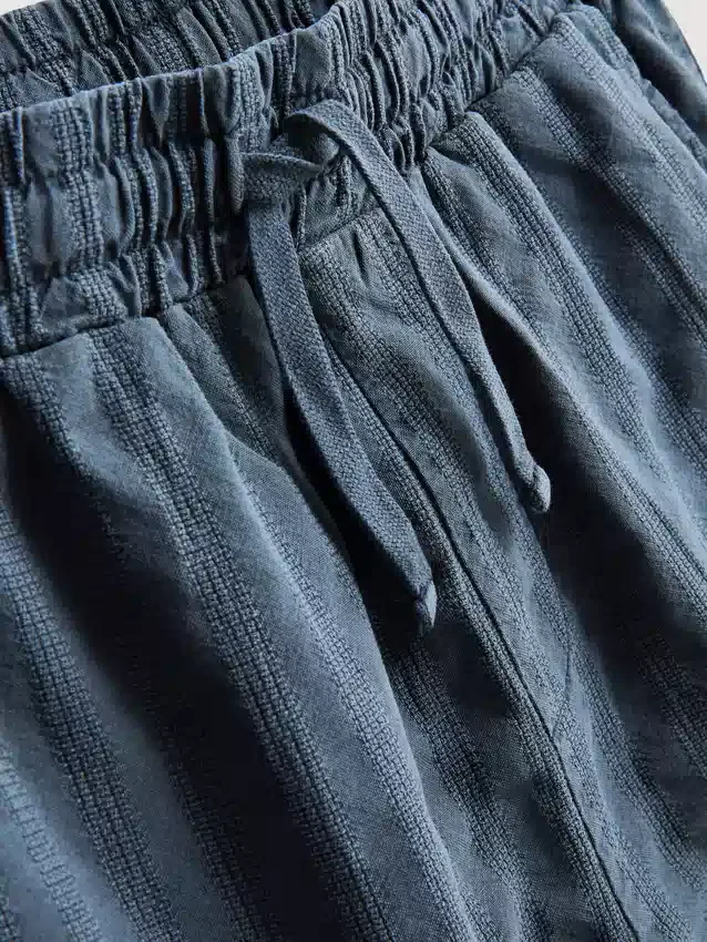 7-15 jaar | set bestaande uit een gestructureerd overhemd met korte mouwen en knopen en een korte broek