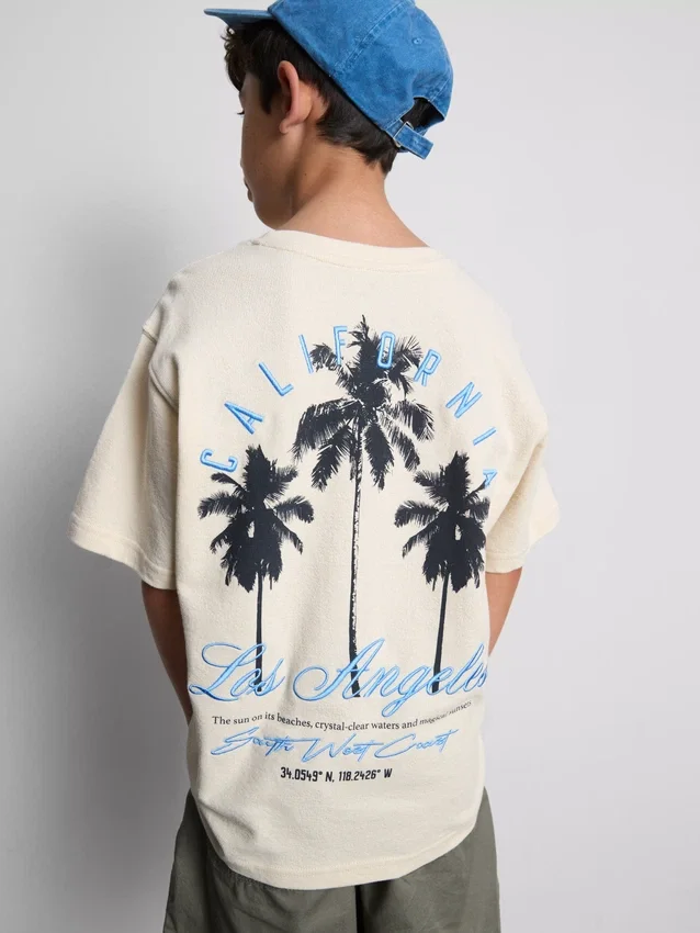 7-15 jaar | T-shirt met palmboomprint en structuur