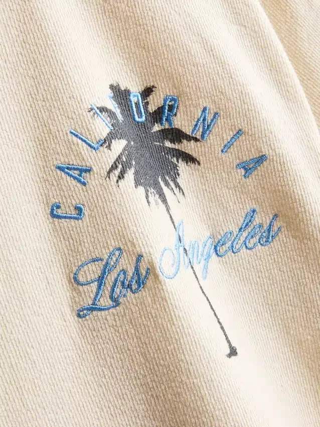 7-15 jaar | T-shirt met palmboomprint en structuur