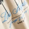 7-15 jaar | T-shirt met palmboomprint en structuur