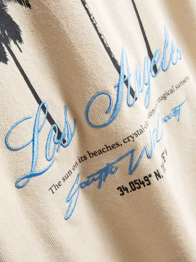 7-15 jaar | T-shirt met palmboomprint en structuur