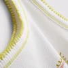 7-15 jaar | tanktop met contrasterende stiksels