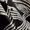 Abstract overhemd met korte mouwen en bladmotief