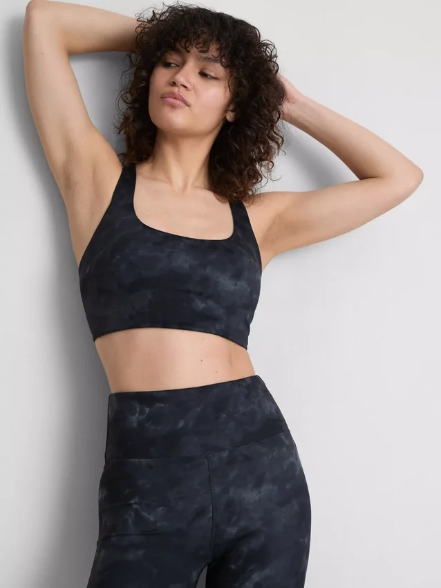 Actieve crop top met racerback en marmerprint