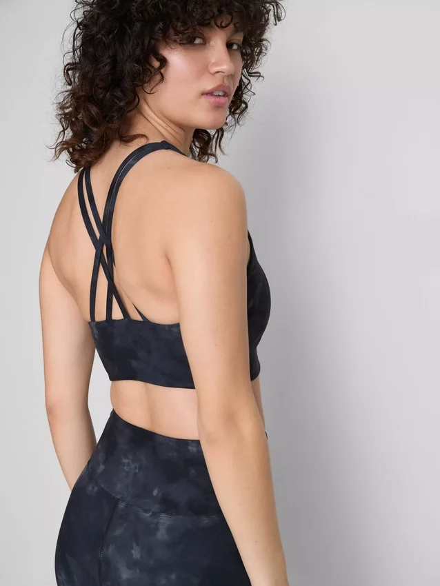 Actieve crop top met racerback en marmerprint