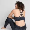 Actieve crop top met racerback en marmerprint