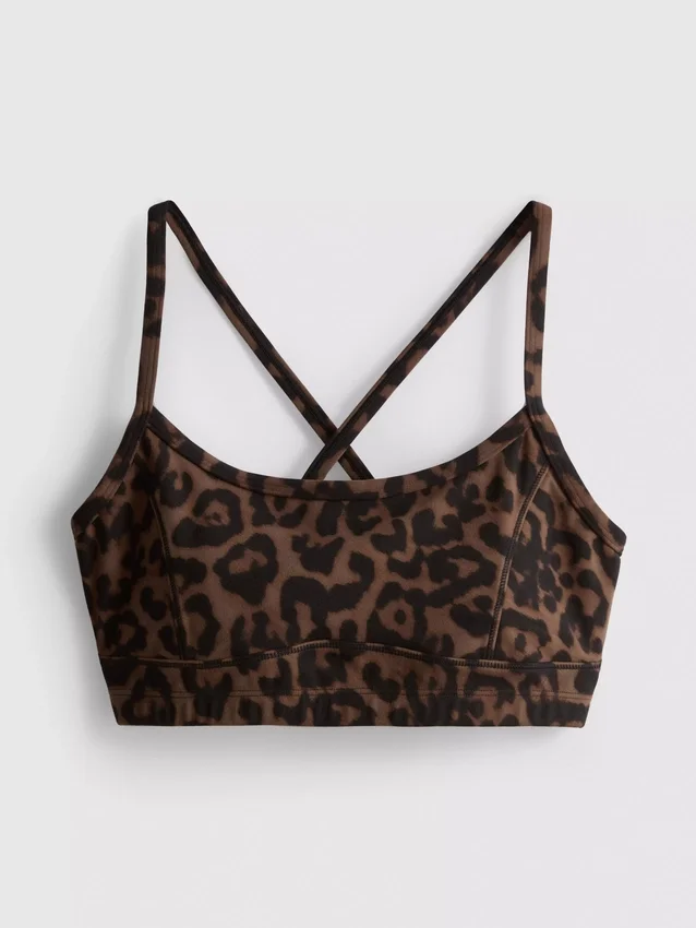 Actieve crop-top met racerback in luipaardprint