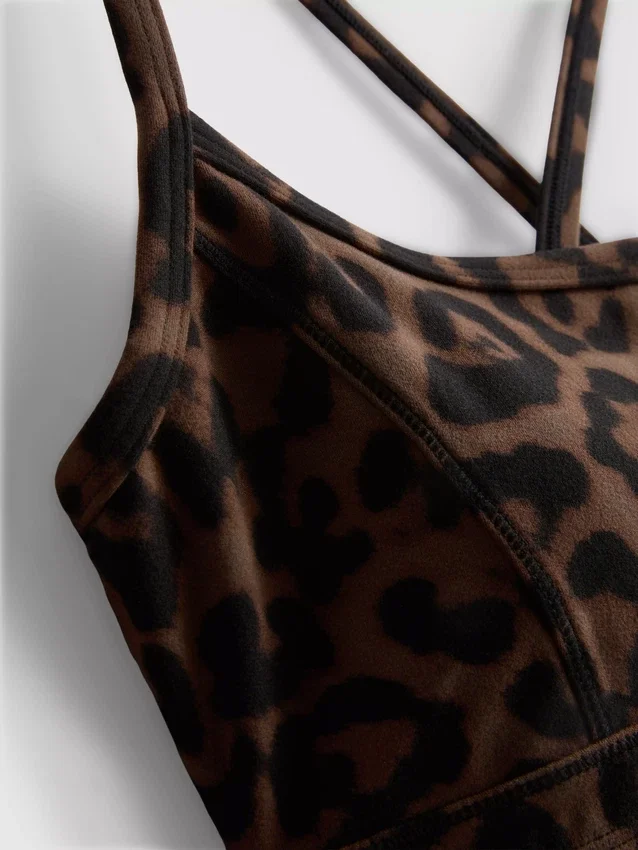 Actieve crop-top met racerback in luipaardprint