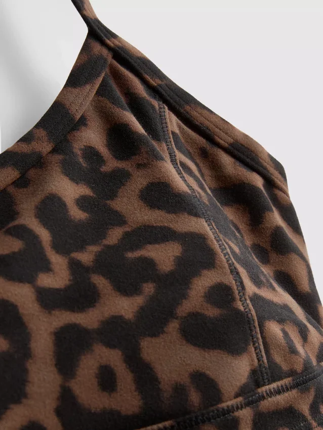 Actieve crop-top met racerback in luipaardprint