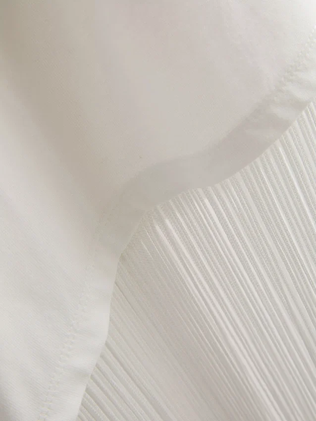 Asymmetrisch T-shirt met franjes van katoen