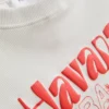 Baby-T-shirt met grafische print, rijk aan katoen, in de kleur Havana
