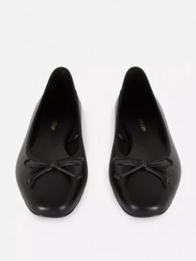 Ballerina’s met strik als platte schoenen