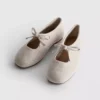 Ballerina's met strikdetail aan de zijkant van de platte schoenen
