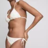 Bikinibroekje met borduursel en strik aan de zijkant