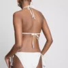Bikinibroekje met borduursel en strik aan de zijkant