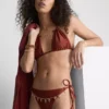 Bikinibroekje met kettingdetail en strik aan de zijkant