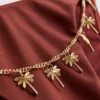 Bikinibroekje met kettingdetail en strik aan de zijkant