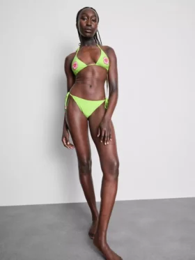 Bikinibroekje met kralen en strik aan de zijkant