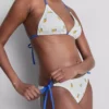 Bikinibroekje met structuur in citroengeel en strikjes aan de zijkant