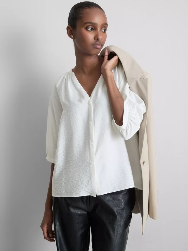 Blouse met 3/4-mouwen en V-hals