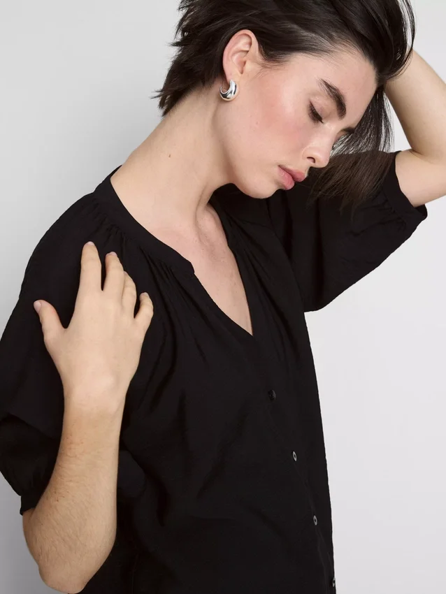 Blouse met 3/4-mouwen en V-hals