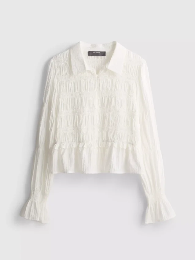 Blouse met gerimpelde peplumzoom
