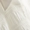 Blouse met gerimpelde peplumzoom