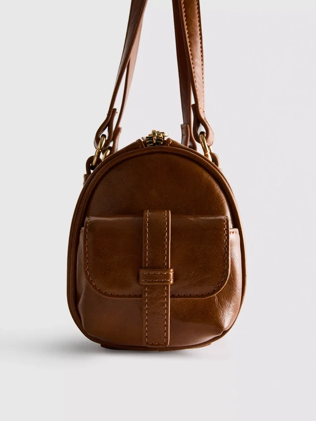 Bowlertas van verouderd imitatieleer