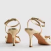 Breed uitgesneden sandalen met bloemenprint en strass op hakken