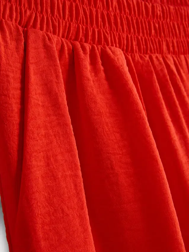 Broek met elastische taille en wijde pijpen