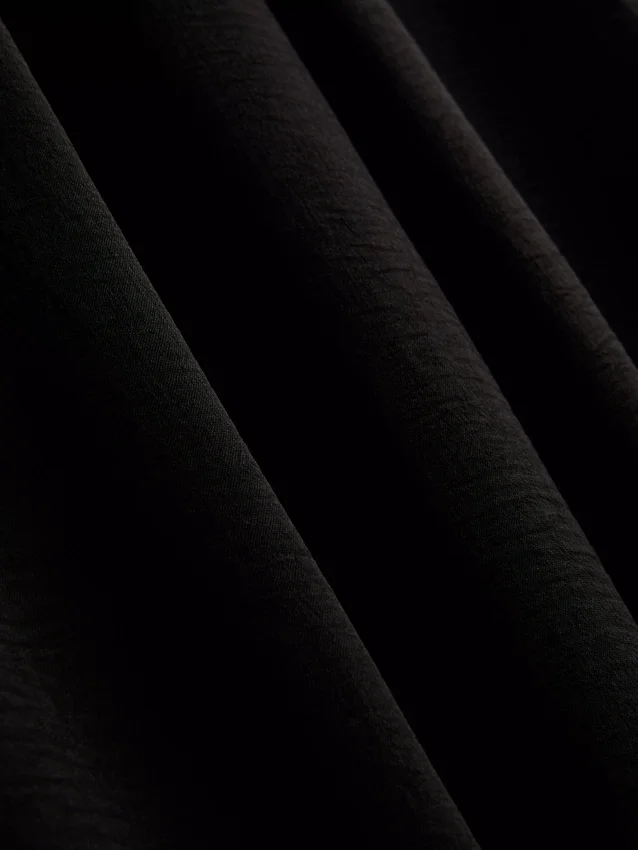 Broek met elastische taille en wijde pijpen