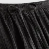 Broek met gekreukelde stof en wijde pijpen