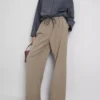 Broek met plooien en wijde pijpen