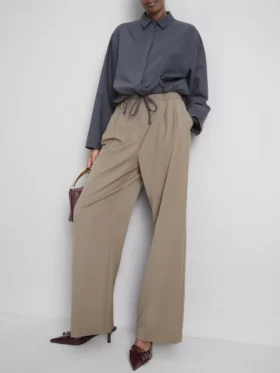 Broek met plooien en wijde pijpen