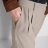 Broek met plooien en wijde pijpen