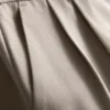 Broek met plooien en wijde pijpen