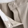 Broek met plooien en wijde pijpen